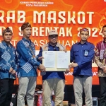 Kirab maskot Pilkada 2024 di Kota Pasuruan.