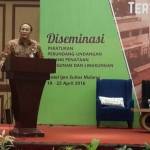 Kepala Dinas PU Cipta Karya Provinsi Jatim DR. Ir. Gentur Prihantono SP.MT.MH saat memberikan sambutan.