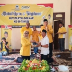 Acara potong tumpeng di DPD Golkar Pasuruan dalam rangka HUT Golkar ke-60