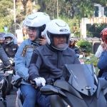 Kapolres Malang Kota AKBP Asfuri bersama istrinya saat persiapan perjalanan menuju Pantai Ungapan, bersama jajaran Forkopimda, Minggu (17/02). foto: ist