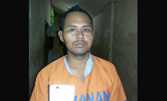 Guruh Budiono, tersangka pencurian HP.