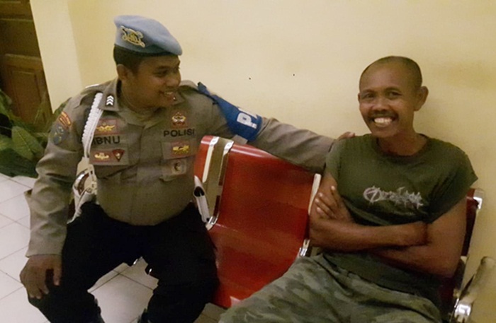Terlapor pencabulan saat diamankan di Mapolres Situbondo.