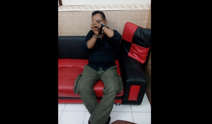 Tersangka MS saat ditangkap petugas Satreskrim Polres Lamongan.