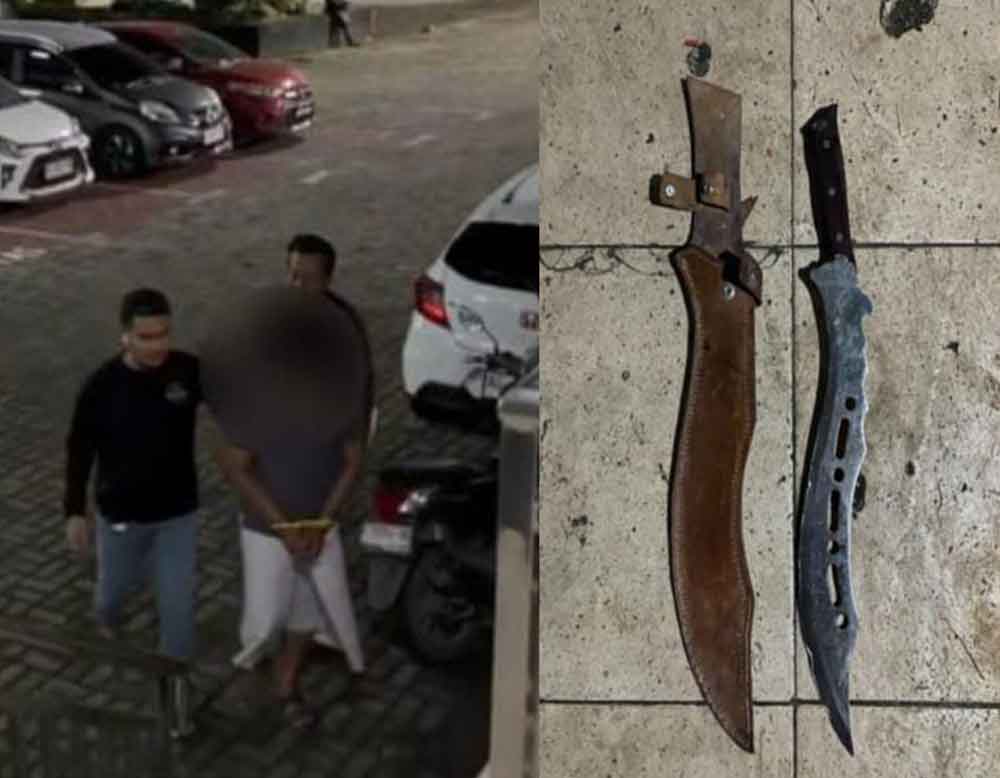 Pelaku S (45) beserta barang bukti parang diamankan di Mapolres Gresik. (Ist)