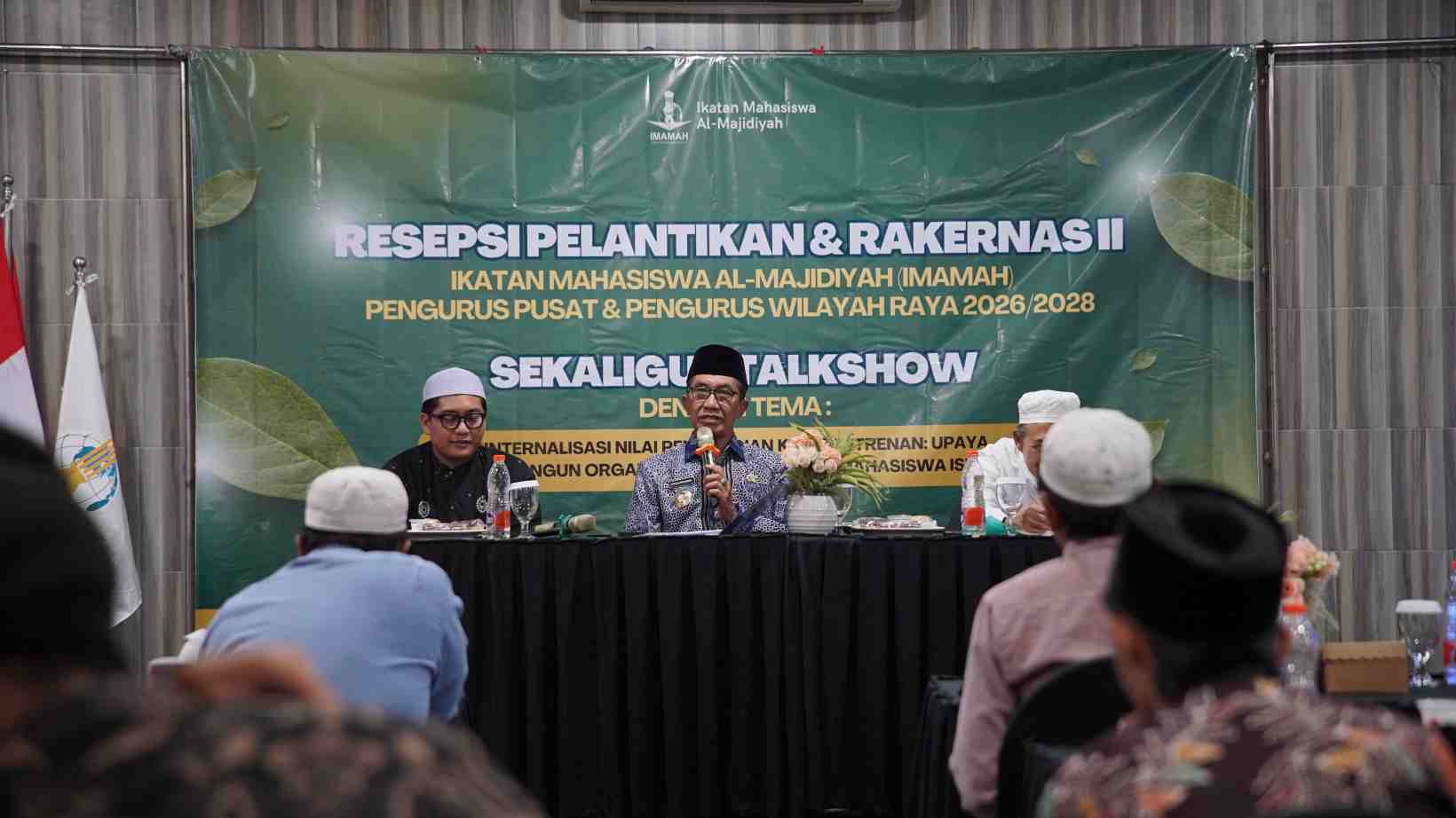 Bupati Pamekasan, Kholilurahman saat memberi sambutan di resepsi dan pelantikan pengurus Ikatan Mahasiswa Al Majidiyah (Imamah) Plakpak Pegantenan