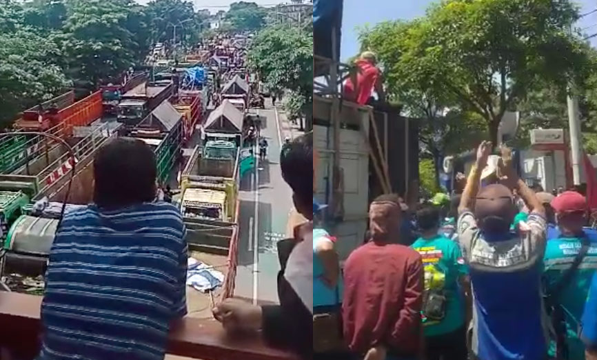 Kondisi Frontage Jalan A. Yani Surabaya yang dipadati oleh truk-truk besar.