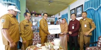 Pemkot Batu Serahkan Santunan dan Beasiswa untuk 3 Keluarga Peserta BPJS Ketenagakerjaan