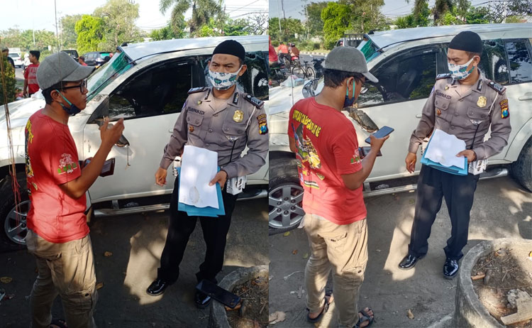 Petugas melakukan olah TKP di lokasi kejadian.