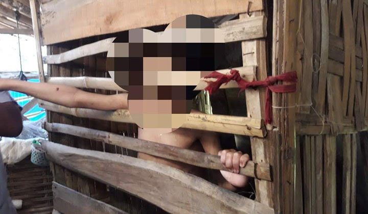 Mohammad Efendi, bocah yang mengalami keterbelakangan mental dikurung di bekas kandang ayam di Dusun Bringin, Desa Angsanah, Kecamatan Palengaan, Kabupaten Pamekasan.