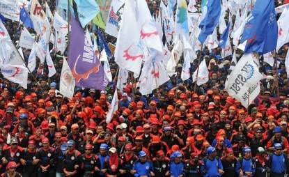 Ilustrasi: demo buruh saat peringatan May Day. (foto: fahreenheat.com)