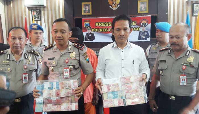 Polisi saat merilis tersangka dan sekaligus BB.