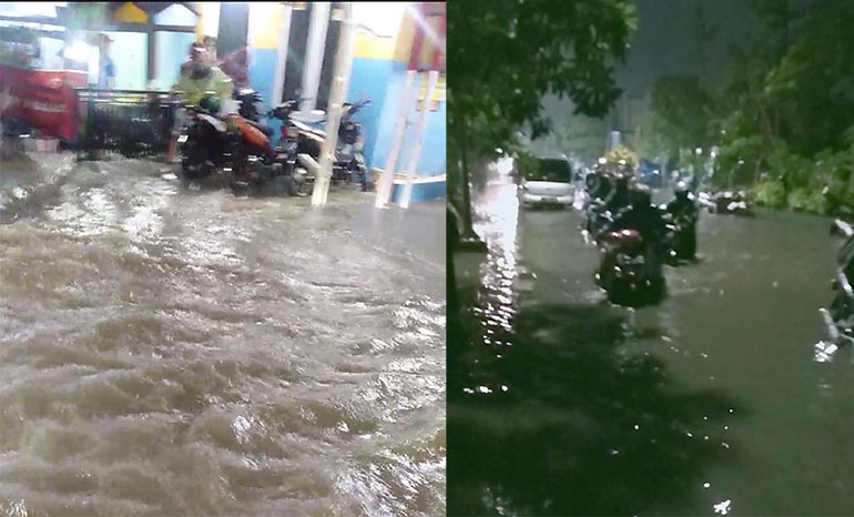 Sejumlah ruas jalan di kawasan Surabaya Barat yang tergenang banjir usai diguyur hujan deras, Senin (28/12) malam.