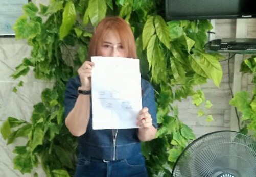 NH saat menunjukkan Laporan Polisi