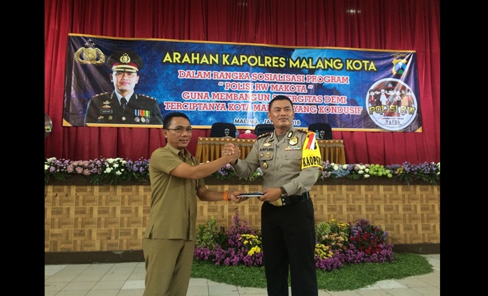 

AKBP Asfuri, SIK.MH, Kapolres Malang Kota, ketika ada satu acara dengan BP2D (Dispenda) Kota Malang. Foto: IST