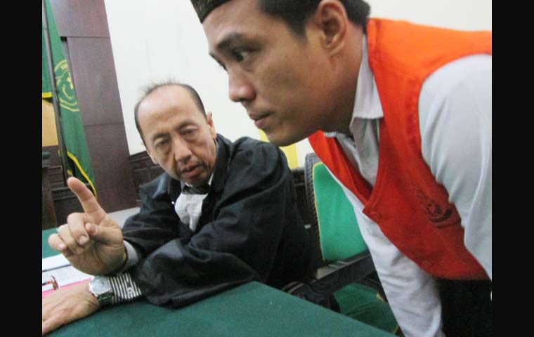 Terdakwa Judi Rianto dalam persidangan di PN Mojokerto