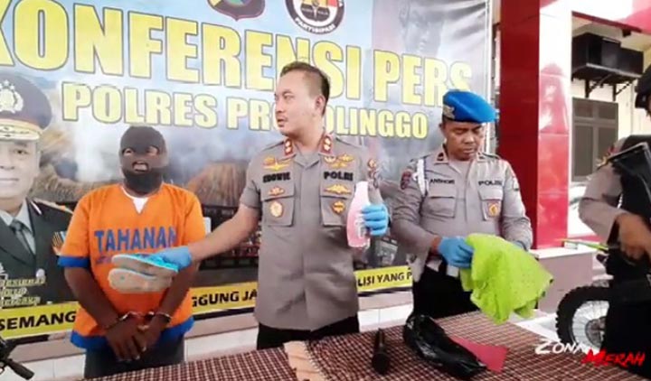 Pelaku saat dirilis di Mapolres oleh Kapolres Probolinggo, AKBP Eddwi Kurniyanto.