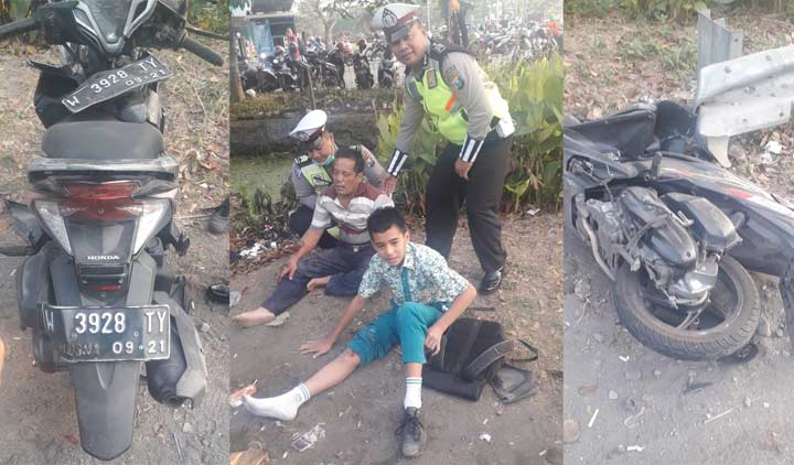 Pengendara motor dan anaknya hendak dievakuasi oleh petugas.