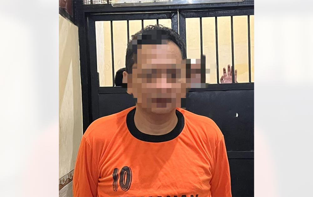 MZ, tersangka penipuan saat diamankan di Mapolres Pamekasan.