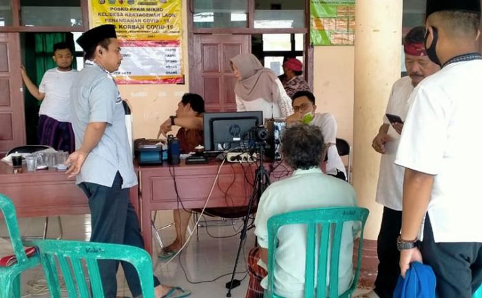 Realisasikan Program Jebol, Dispenduk Pamekasan Lakukan Perekaman E-KTP di Balai Desa