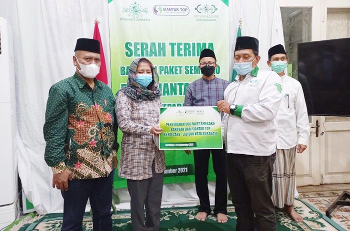 Gandeng LAZISNU Surabaya, PT Siantar Top Salurkan 500 Paket Sembako untuk Warga Terdampak Covid-19