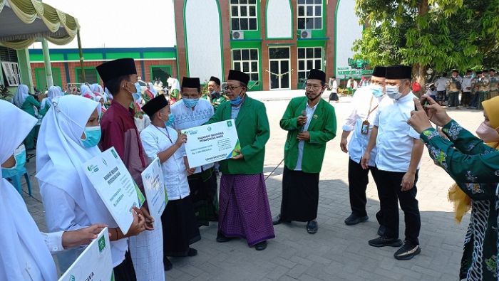 Peringati HSN 2021, PCNU Mojokerto Berikan Santunan dan Beasiswa 1.002 Anak Yatim