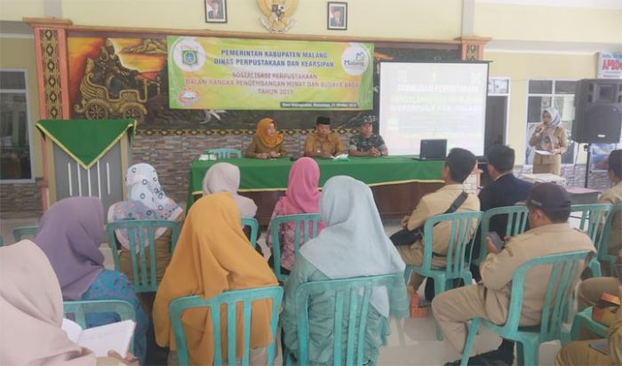 Dispusip Malang Gelar Sosialisasi Pengembangan Minat dan Budaya Baca di Lokasi TMMD 106