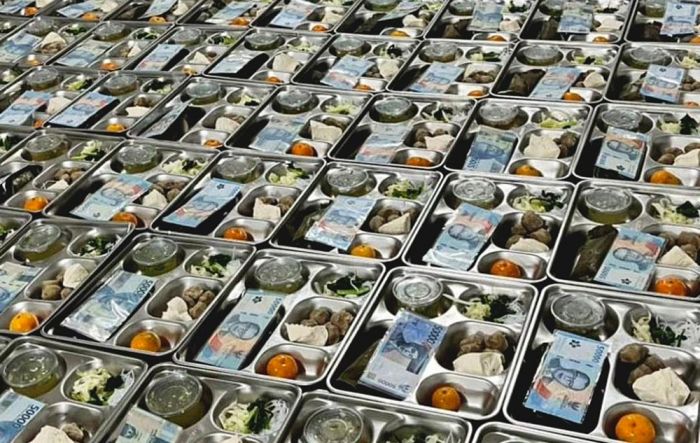 Haji Her Selipkan Uang Rp50 Ribu di Ompreng MBG Ribuan Siswa di Bangkalan