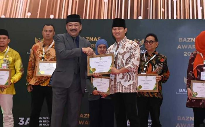Bupati Arifin Raih Penghargaan Baznas Award