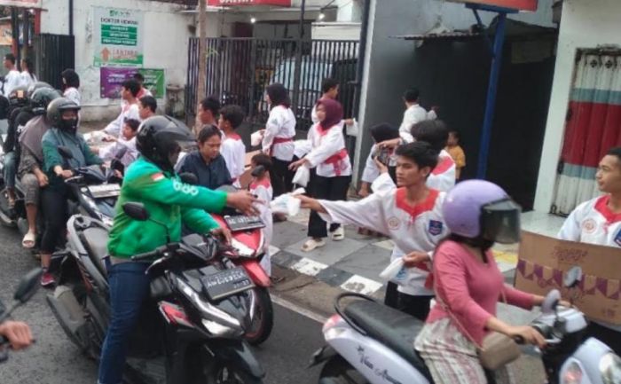 Perguruan Silat Merpati Putih Cabang Kota Kediri Berbagi 1000 Takjil Gratis ke Warga