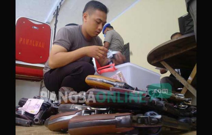 Surat Sudah Kadaluarsa, 113 Senpi Anggota Polres Pasuruan Ditarik Surat Sudah Kadaluarsa, 113 Senpi Anggota Polres Pasuruan Ditarik