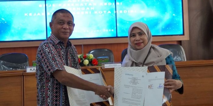 Kepala Kejaksaan Negeri Kota Kediri, Rivo Ch. M. Medellu dan Kepala BPJS Kesehatan Cabang Kediri, Tutus Novita Dewi. (Ist)