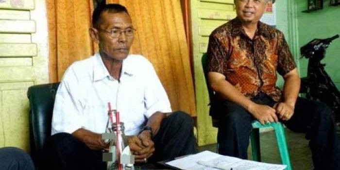 Era Laksana (kanan), Ketua RT 09 Kelurahan Ketanggi Ngawi. foto: ist