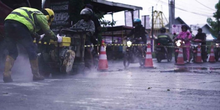 Pembukaan jalan beton lajur arah Semarang dan lajur arah Purwodadi di KM Smg 21+715-21+717, Demak, Jawa Tengah, setelah direkonstruksi. Foto: Ist