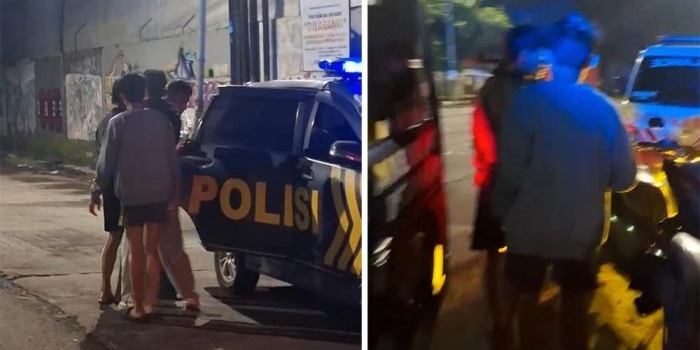 Petugas saat mengamankan sejumlah remaja beratribut silat usai mendapat laporan warga.