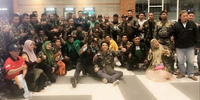 Gerakan Pemuda Ansor bersama anggota Banser menggelar nonton bareng Film Bumi itu Bulat di Surabaya. foto: ist.