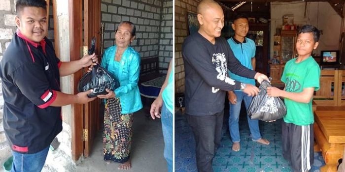 Para anggota komunitas CB Tuban saat bagi-bagi sembako.
