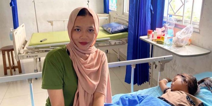 Alifia Zumrotul Nisa (21), seorang mahasiswa yang menjadi peserta JKN dari Kecamatan Kandat, Kabupaten Kediri.