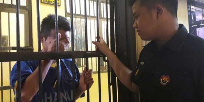Pelaku saat berada di tahanan Polres Pasuruan.