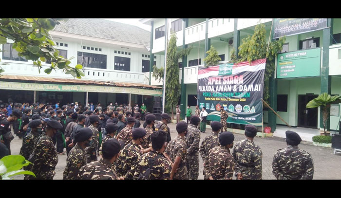 Ribuan anggota Banom NU Kabupaten Tuban menggelar Apel Siaga Pilkada Damai, Rabu (02/12/20).