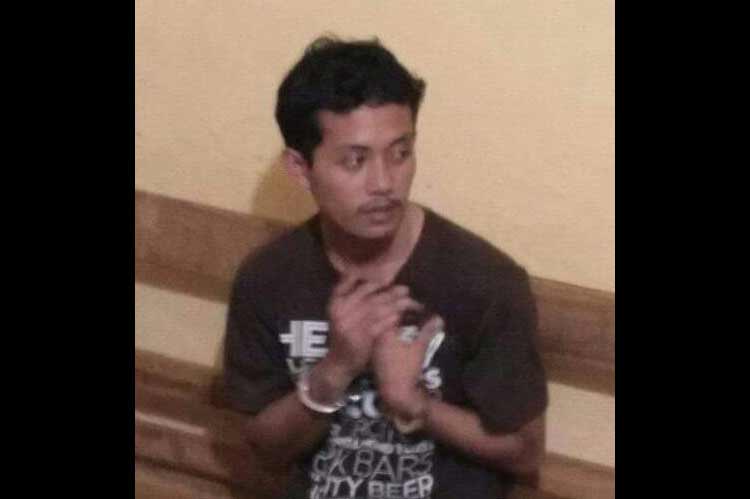 Pelaku yang sudah ditangkap polisi. foto: ist