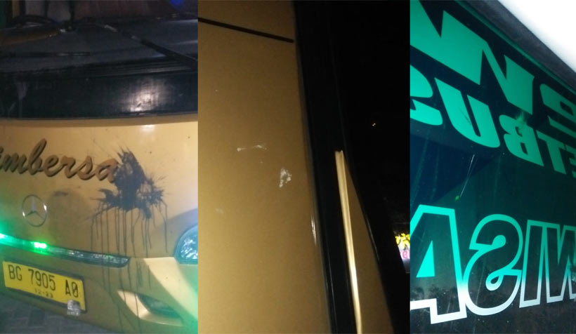 Foto-foto bus Persatu yang diteror oleh oknum suporter. Tampak kaca pecah dan bodi bus penyok akibat lemparan batu.