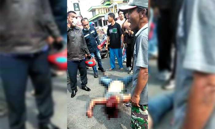 Warga saat mengerumuni ARH (28), warga Desa Bener, Kecamatan Tegalrejo, Yogyakarta, yang membawa kabur mobil di Kahuripan Nirwana Village, Sidoarjo.