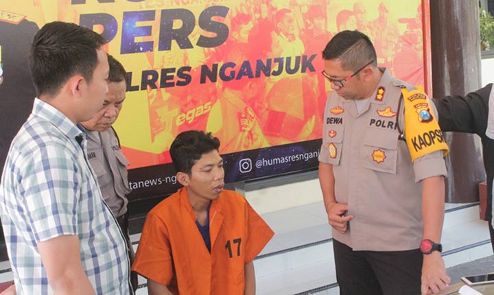Kapolres Dewa Nyoman NW bersama tersangka sepesialis pembobol gudang beras dan sapi. foto: BAMBANG/ BANGSAONLINE