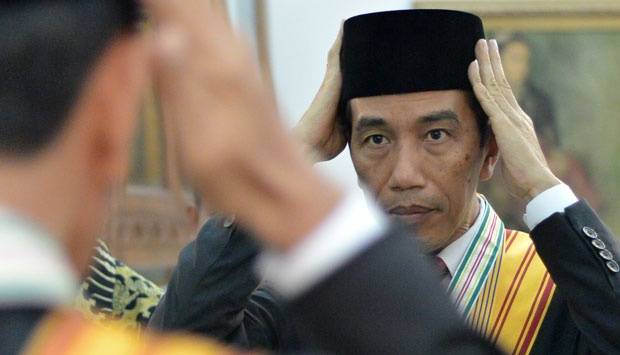 Presiden Jokowi saat pemotretan resmi.  Foto: tempo.co.id