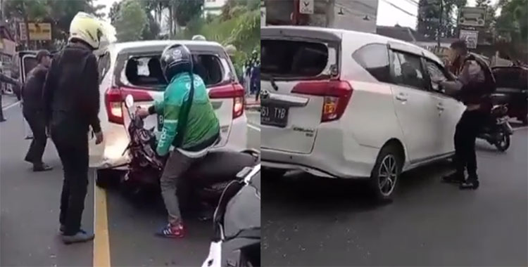 Mobil Toyota Calya warna putih bernopol B 2561 TYB yang dikemudikan WNA dirusak warga di Pasar GSP, Desa Cibadak, Sukaresmi, Cianjur, Sabtu (16/4)