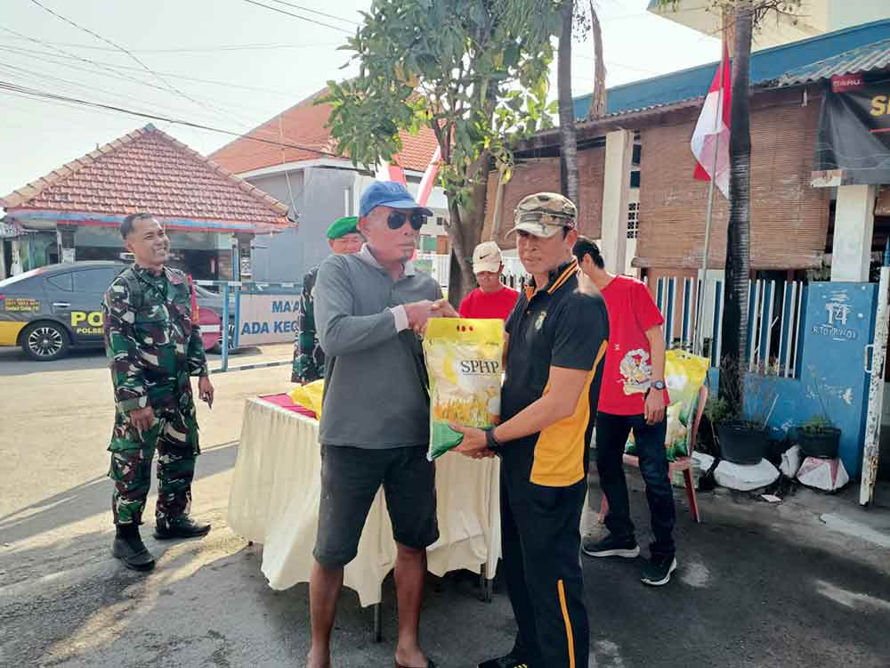 Polsek Buduran Bersama Koramil Distribusikan Beras SPHP Melalui Program GPM