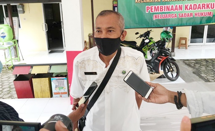 Andung Suroso, Lurah Kepatihan saat memberikan keterangan kepada awak media.