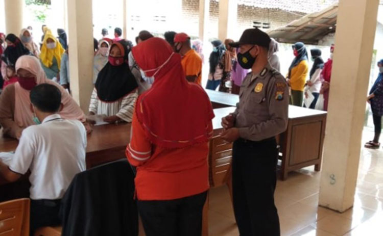 Kembali Bergulir, 5.016 Warga Kecamatan Mojo Kediri Terima Penyaluran BST Tahap XI Tahun 2021