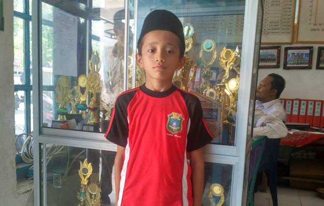 Farid, juara MTQ Tuban dari cabang tilawah. foto: AHMAD/ BANGSAONLINE