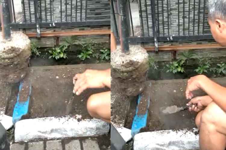 Kepulan asap dari tanah di Perum Griya Candramas Sedati, Sidoarjo.